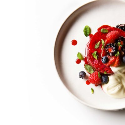 Summer Pudding Summer Pudding. Recipe from the Wolseley in London. Pastry Chef Yann Lentilly. Summer berries cooked with sugar, soaking brioche slices and refrigerated in a mold. Served with fresh berries, crème fraiche and mint leaves.
