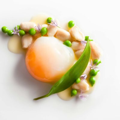 Egg Poached Aracuana Egg with Vin Jaune, Garden Peas and Everglades Frog Legs prepared by Daniel Humm, Executive Chef of Eleven Madison Park in NYC.